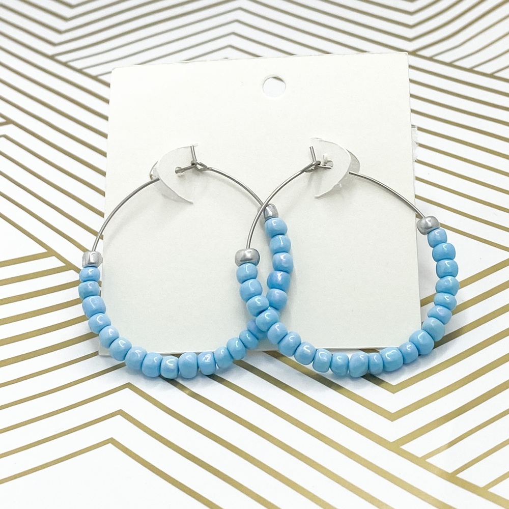 Silver earrings light blue beaded hoops